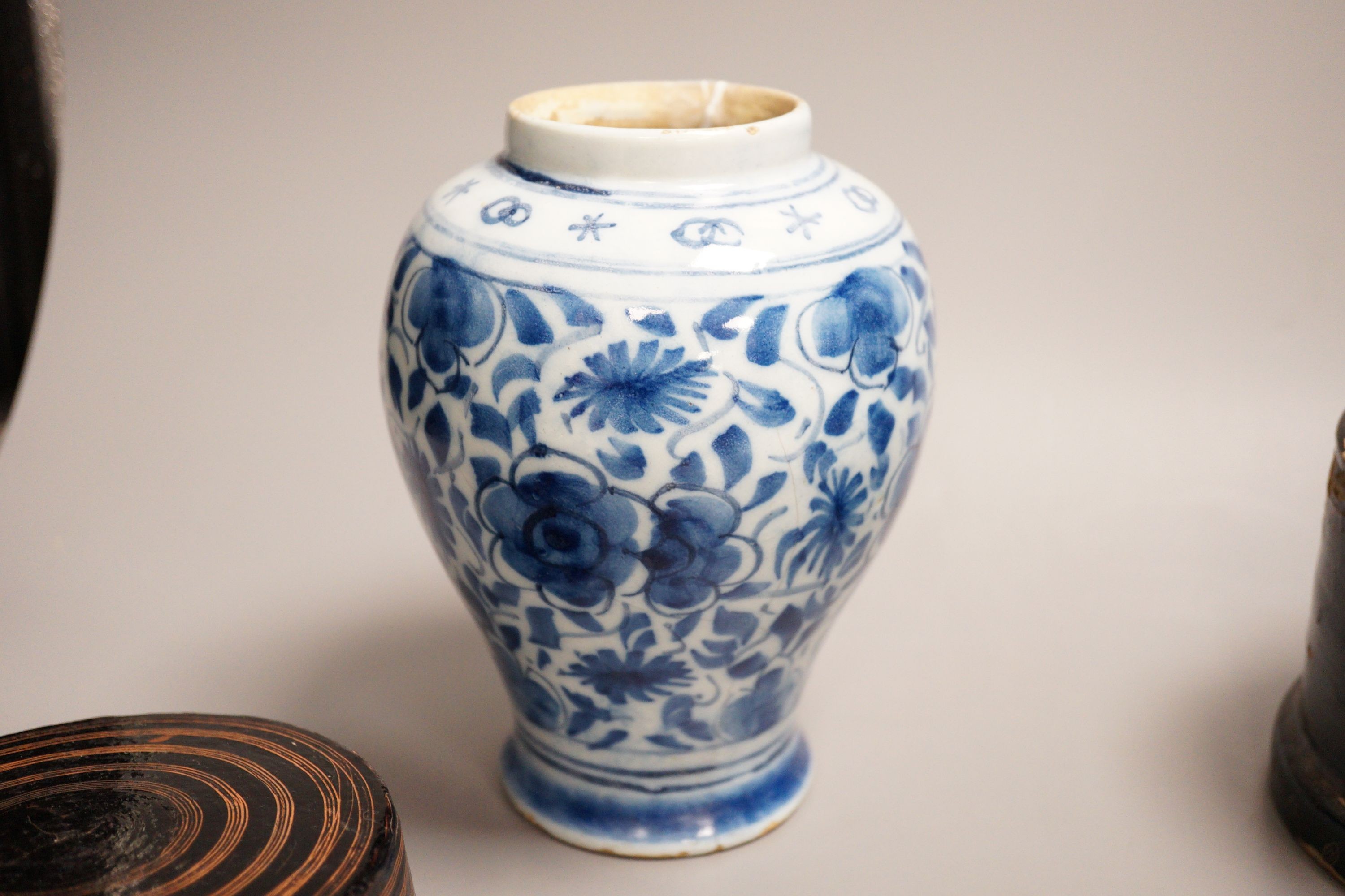 An 18th century Delft blue and white vase, a similar plate and two papier mache boxes, plate diameter 23cm